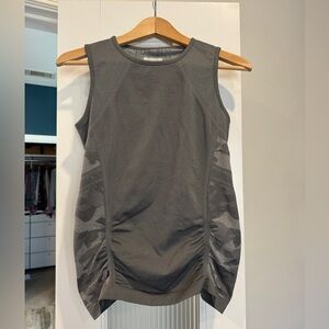 Athleta grey tank top with camo panels. Very good condition.